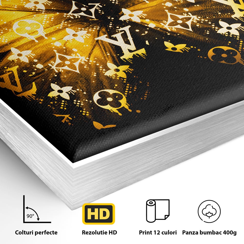 Detaliu al suprafetei: tablou canvas cu fluture auriu, in rama de aluminiu argintiu